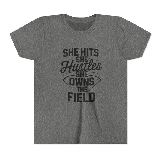 She Hits She Hustles She Owns the Field Youth Short Sleeve Tee