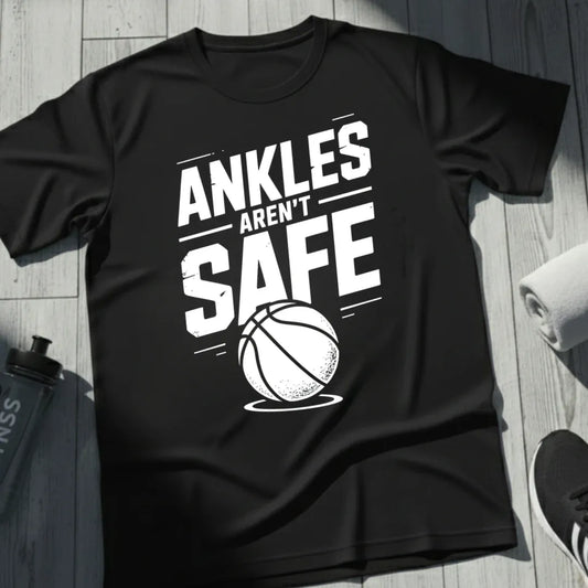 https://wescale-cdn.com/generated-mockups/79251b0a-9dea-433f-b5c7-f6b0b888908a/0f442b19-8739-4b08-981b-e73b6b3e0d0c/f34d255d-85dc-4331-830e-8e41202e03aa_designs/ankles_aren_t_safe_white_done_1776960241197_to5p9s.png_1776960244977.webp