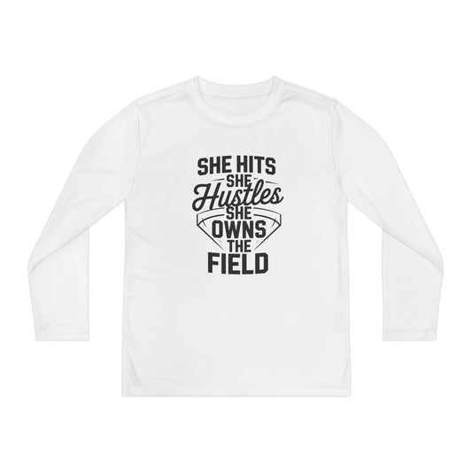 She Hits She Hustles She Owns the Field Youth Long Sleeve Competitor Tee
